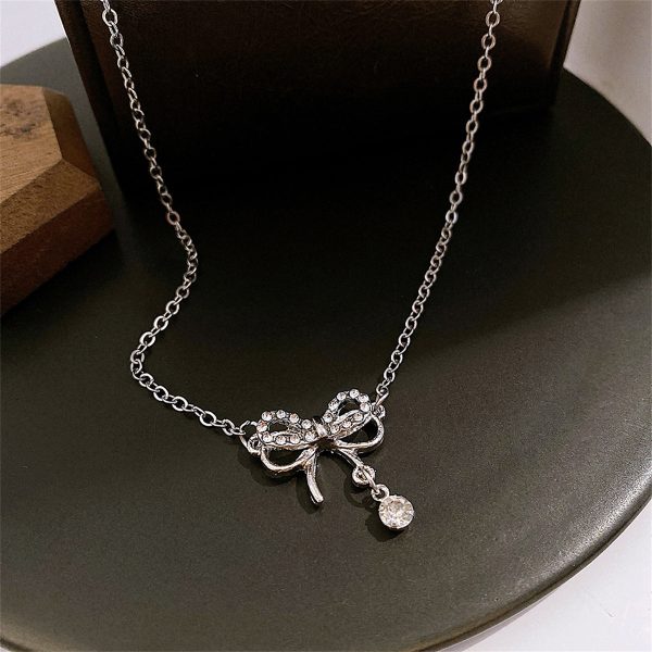 Cubic Zirconia & Silver-Plated Bow Pendant Necklace For Discount